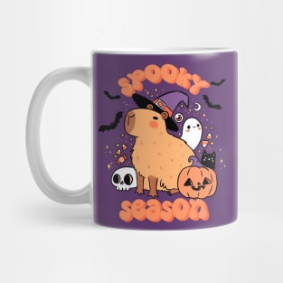 Spooky season  a cute capybara ready for halloween Mug